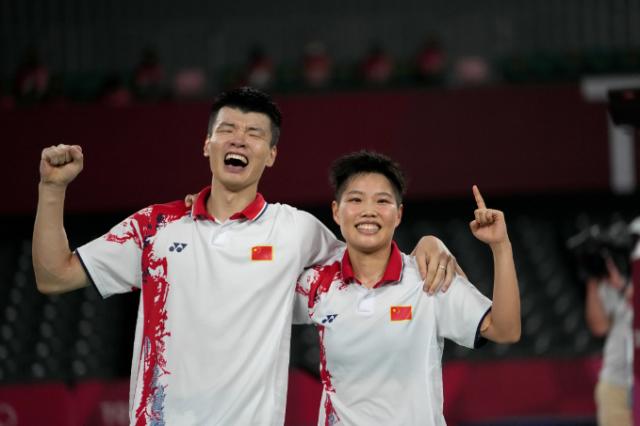 1627633990843051376.png 开云体育-黄东萍:从随时准备回家的小姑娘 到奥运混双冠军